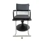 Hairdressing chair made of black imitation leather in a stylish design